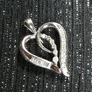 10k .25 ctw Diamond Journey Heart Pendant